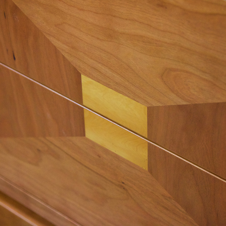 Quarter matched veneer with Huon Pine inlay